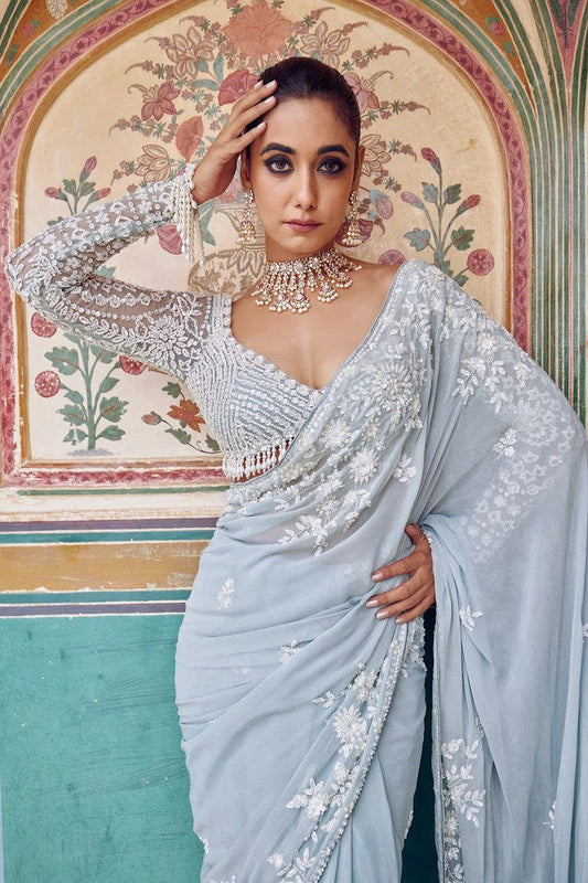 Graceful Sky Blue Faux Georgette Embroidery Work Saree