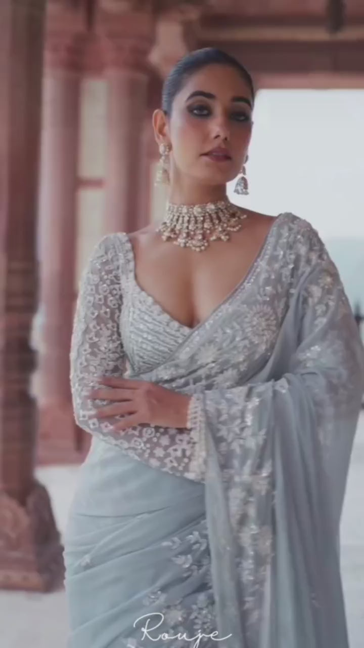 Graceful Sky Blue Faux Georgette Embroidery Work Saree